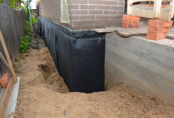 SJ Waterproofing Pros technician performing targeted Exterior Waterproofing assessment in Miami, IN